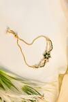 Buy_Shlok Jewels_Green Crystals Kundan Floral Rakhi _at_Aza_Fashions