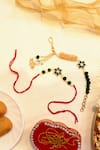 Buy_Shlok Jewels_Green Gemstones, Crystals Kundan And Semi-precious Rakhi Set _at_Aza_Fashions