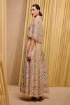 Tarun Tahiliani_Gold Tulle Hand Embroidery Sequin Stand Collar Architecture Motif Cape _at_Aza_Fashions