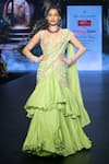 Anu Pellakuru_Green Raw Silk Embroidered Beads Tiered Ruffle Pre-draped Saree With Blouse _Online_at_Aza_Fashions