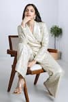 Komal Shah_White Coine Embroidered Sequin Lapel Collar Blazer And Pant Set _at_Aza_Fashions