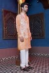 Ankur J_Orange Habutai Silk Printed Floral Asymmetric Bundi Kurta Set _at_Aza_Fashions