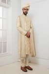 Buy_Darshika Menswear_Beige Raw Silk Embroidered Zardosi Sherwani Churidar Set _Online_at_Aza_Fashions