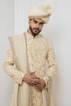 Darshika Menswear_Beige Raw Silk Embroidered Zardosi Sherwani Churidar Set _at_Aza_Fashions