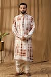 Buy_Kudrat Couture_Off White Chanderi Silk Asymmetric Tie-dye Kurta And Churidar Set _at_Aza_Fashions