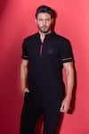 Buy_AMIT ARORA_Black Poly-knit Textured Threadwork Straight Knitted T-shirt _at_Aza_Fashions