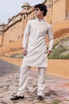 Buy_AMIT ARORA_Beige Poly Knit Tape Work Kurta With Aligadi Pant _at_Aza_Fashions