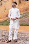 Buy_AMIT ARORA_White Poly Knit Tape Geometric Work Kurta With Aligadi Pant _at_Aza_Fashions