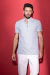 Buy_AMIT ARORA_Blue Poly-knit Textured Threadwork Knitted T-shirt _at_Aza_Fashions