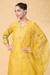 Pouli Pret_Yellow Chanderi Embroidery Floral Notched Resham Kurta And Pant Set _at_Aza_Fashions