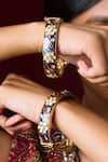 Buy_Queens Jewels_Blue Stones, Metallic Thread, Zari Kundan Meenakari Bangles-Set of 2 _at_Aza_Fashions