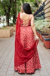 Shop_Essay by Sumedha Agrawal_Red Organza Satin Hand Embroidered Mirror Work Halter Floral Print Lehenga Set _at_Aza_Fashions