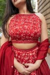 Essay by Sumedha Agrawal_Red Organza Satin Hand Embroidered Mirror Work Halter Floral Print Lehenga Set _at_Aza_Fashions