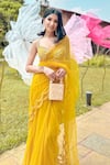 Buy_Seeaash_Yellow Net Embroidery Pearl Sweetheart Neck Pre-draped Saree With Blouse 