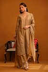 Buy_OMANA BY RANJANA BOTHRA_Beige Kurta And Trouser Cotton Satin Applique Floral V Neck Pakeeza Set _at_Aza_Fashions