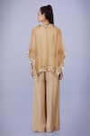 Shop_DILNAZ_Gold Net And Blended Satin Embroidery Crystal V Sequin Sheer Kaftan With Jumpsuit _at_Aza_Fashions