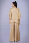 Shop_DILNAZ_Gold Blended Satin Plain V Neck Tassel Work Kaftan With Jumpsuit _at_Aza_Fashions