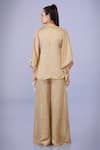 Shop_DILNAZ_Gold Blended Satin Embellished Feather V Neck Border Kaftan _at_Aza_Fashions