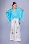 Buy_DILNAZ_Blue Blended Satin Embellished Feather V Neck Tassel Bordered Kaftan _at_Aza_Fashions