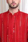 Aham-Vayam_Red Cotton Embellished Mirrorwork Kaanchkaari Kurta With Patiyala _at_Aza_Fashions