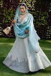 Buy Mrunalini Rao Blue Silk, Organza Zari, Embroidery Taara Bloom Zardozi Work Bridal Lehenga Set Buy_Mrunalini Rao_Blue Silk, Organza Zari, Embroidery Taara Bloom Zardozi Work Bridal Lehenga Set