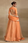 Shop_Trendy tokari_Peach Silk Tissue Woven Zari V Neck Leher Wave Lehenga Set _at_Aza_Fashions