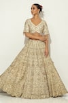 Shop_Vandana Sethi_Ivory Silk Tassels, Beads, Embroidery Bandeau Gul Zardozi Bridal Lehenga Set _at_Aza_Fashions
