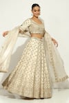 Buy_Vandana Sethi_Ivory Shimmer Raw Silk Embroidery Zardozi Leaf Padma Bagh Bridal Lehenga Set _at_Aza_Fashions