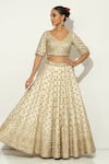 Shop_Vandana Sethi_Ivory Shimmer Raw Silk Embroidery Zardozi Leaf Padma Bagh Bridal Lehenga Set _at_Aza_Fashions