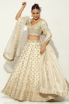 Vandana Sethi_Ivory Shimmer Raw Silk Embroidery Zardozi Leaf Padma Bagh Bridal Lehenga Set _at_Aza_Fashions