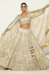 Shop_Vandana Sethi_Ivory Shimmer Raw Silk Embroidered Zardosi V Neck Oriental Lehenga Set _at_Aza_Fashions