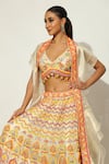 Buy_Vandana Sethi_Ivory Shimmer Raw Silk Embellished Sequin V-neck Floral Bead Lehenga Set _Online_at_Aza_Fashions