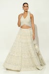 Shop_Vandana Sethi_Ivory Shimmer Organza Embellished Pearl Halter Neck Floral Bridal Lehenga Set _Online_at_Aza_Fashions