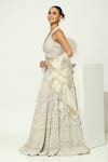 Vandana Sethi_Ivory Shimmer Organza Embellished Pearl Halter Neck Floral Bridal Lehenga Set _at_Aza_Fashions