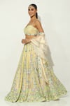 Vandana Sethi_Ivory Shimmer Organza Embellished Sequin Floral Vine Bead Bridal Lehenga Set _at_Aza_Fashions