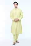 Buy_Kishore Ramani_Green Katan Spacetucked Kurta With Churidar _at_Aza_Fashions