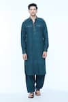 Kishore Ramani_Blue Handloom Silk Textured Stitchline Placket Work Pathani Kurta With Salwar _Online_at_Aza_Fashions