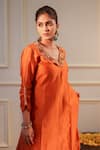 Shop_Flamingo the label_Orange Chanderi Silk Hand Embroidery Floral Plunge V Neck Kurta With Pant _at_Aza_Fashions