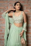 Shop_Pooja Kankariya_Green Silk, Georgette Beads, Zari, Pearls Sweetheart Pleated Tiered Lehenga Set _at_Aza_Fashions