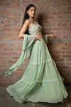 Pooja Kankariya_Green Silk, Georgette Beads, Zari, Pearls Sweetheart Pleated Tiered Lehenga Set _at_Aza_Fashions