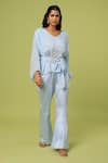Buy_Pooja Kankariya_Blue Chiffon, Lycra V-neck Ruffled Shoulder Pleated Yoke Top Bootcut Pant Set _at_Aza_Fashions