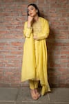 Pooja Kankariya_Yellow Raw Silk Embroidered Zardozi Notched Floral Kurta Pant Set _Online_at_Aza_Fashions