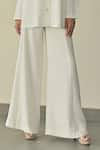 Somya Goyal_White Microfibre Faille- 95% Solid Stella Plain High-waisted Flared Trouser _Online_at_Aza_Fashions