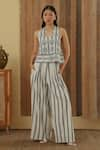 Buy_MUVAZO_White Cotton Dobby Printed Chevron Pleated Pant _at_Aza_Fashions