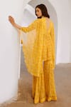 Shop Pallavi Jaipur Yellow Chiffon, Linen Sequins, Exaggerated Sleeve Printed Tunic With Sharara at Aza Fashions Shop_Pallavi Jaipur_Yellow Chiffon, Linen Sequins, Exaggerated Sleeve Printed Tunic With Sharara _at_Aza_Fashions