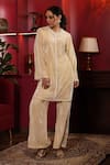 Shop_k-anshika_Off White Velvet Embellished Bead Round Kurta And Flared Pant Set 