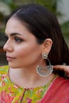 Buy_Anana_Silver Plated Triveni Peacock Carved Earrings _at_Aza_Fashions