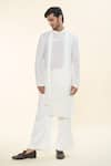 Buy_Prima Czar_White Seersucer Textures Asymmetric Layered Kurta With Pant _at_Aza_Fashions