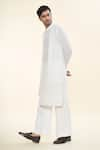 Buy_Prima Czar_White Seersucer Textures Asymmetric Layered Kurta With Pant _Online_at_Aza_Fashions