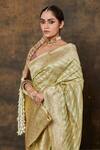 Pinki Sinha_Green Banarasi Pure Silk Handwoven Flower Stripe Saree With Running Blouse _at_Aza_Fashions